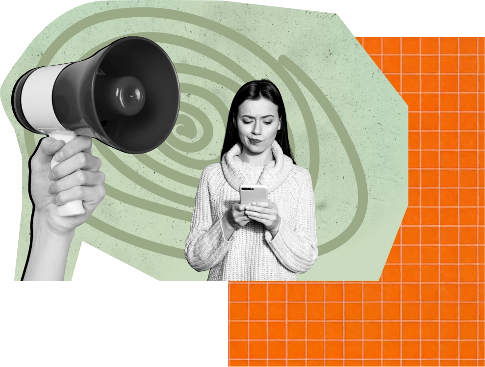 Frau schaut auf Mobiltelefon